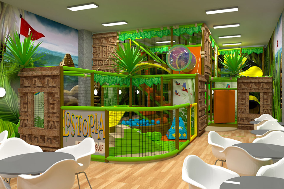 Indoor children's play area featuring a vibrant jungle theme, complete with climbing structures, slides, and soft play zones, surrounded by colourful decor and seating for parents.