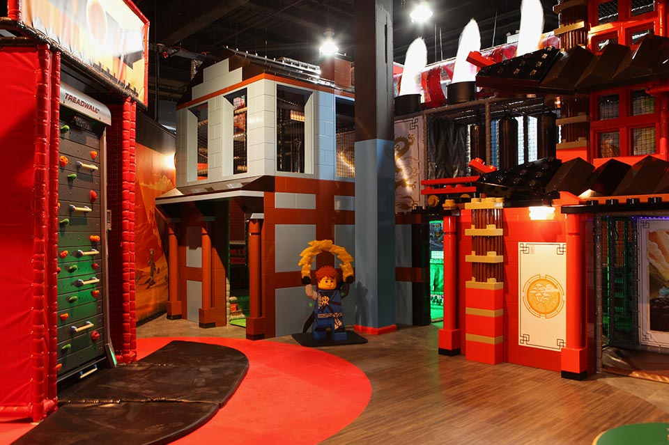 Indoor play area featuring a vibrant and imaginative design with colourful structures, play equipment, and themed decorations, ideal for children's entertainment and exploration.