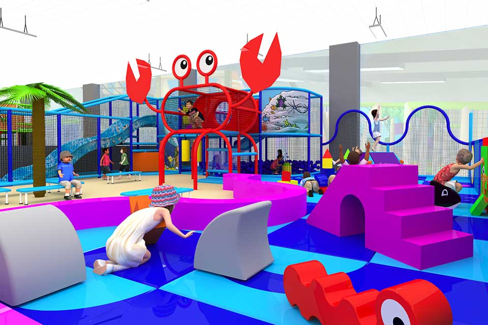 Colourful indoor play area featuring a large crab structure, slides, and various climbing equipment. Children are engaged in play on vibrant mats and soft play elements, promoting physical activity and social interaction in a safe environment.