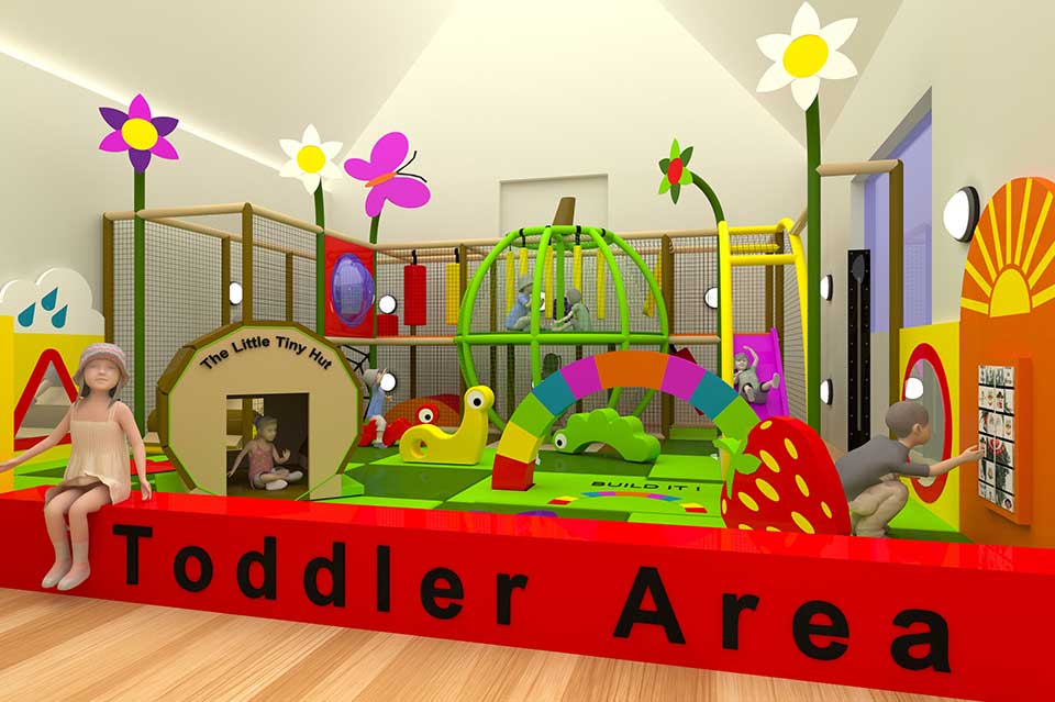 Bright and colourful indoor toddler play area featuring soft play equipment, climbing structures, and interactive elements designed for young children. The space includes playful decorations such as flowers and a rainbow, promoting a fun and engaging environment for toddlers.