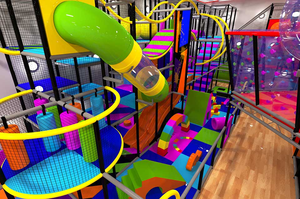 Brightly coloured indoor soft play area featuring climbing structures, slides, and various play equipment designed for children's entertainment and physical activity.