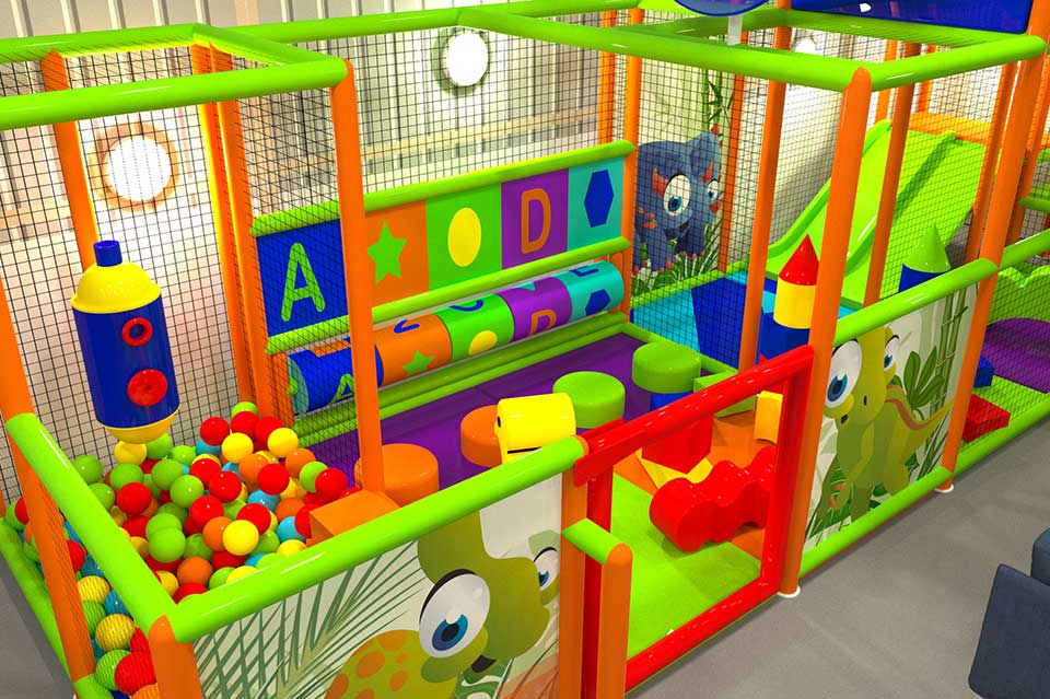 Colourful indoor play area designed for young children, featuring soft play equipment, educational letter blocks, and various shapes for interactive learning and fun.