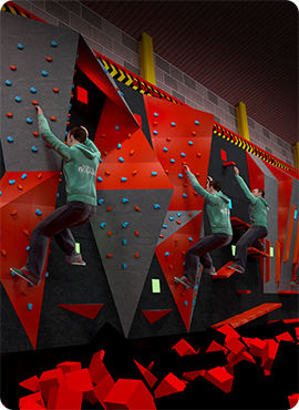 A climber tackling a bouldering wall with colourful holds in an indoor climbing facility, showcasing dynamic movement and athleticism.