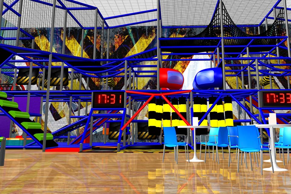 Indoor adventure play area featuring climbing structures, slides, and obstacles in vibrant colours, designed for children's entertainment and physical activity.