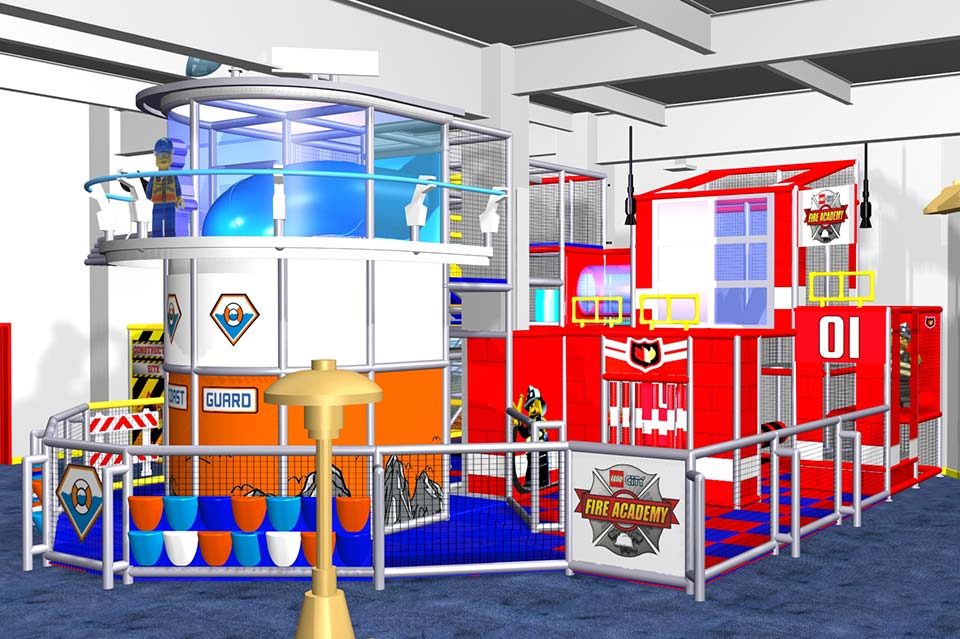 Indoor play area featuring colourful structures, including a water play zone, climbing frames, and interactive activity stations, designed for children’s entertainment and exploration.