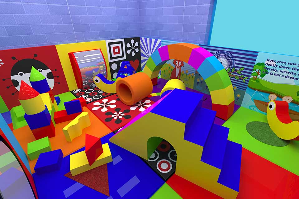 Brightly coloured indoor play area featuring various soft play structures, including slides, tunnels, and climbing shapes, designed for children's fun and physical activity.